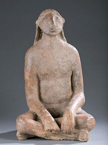 Niger Delta seated clay figure. 15th - 17thc.