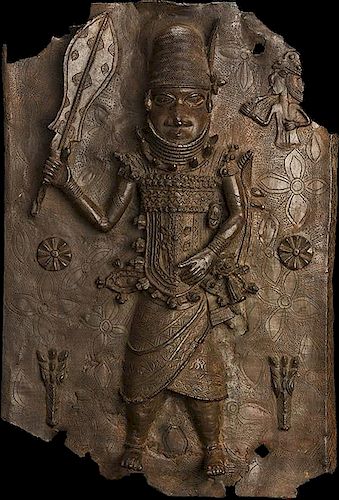 Benin brass plaque with single figure.