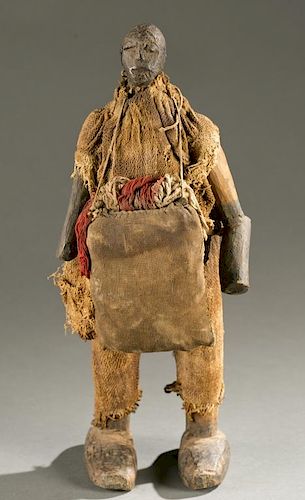 West African standing figure w/ fetish material.
