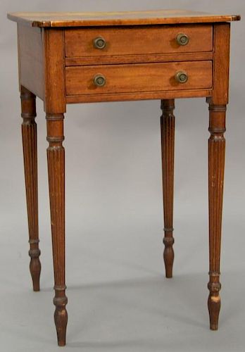 Sheraton two drawer stand with shaped top set on turned and fluted legs, circa 1830. ht. 28 3/4in., top 18" x 18 5/8"