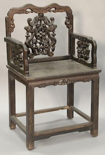 Chinese hardwood armchair with carved back and sides. ht. 38 1/2in., wd. 23 1/4in.