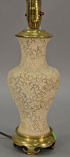 Chinese white cinnabar vase with carved blossoming flowers made into a table lamp. ht. 9in.
