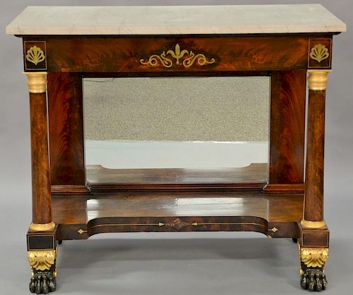 American Classical ormolu mounted and figured mahogany marble topped pier table, frieze with brass inlays, bronze mounted columnar s...