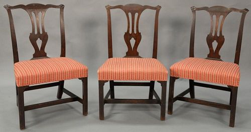 Three Chippendale mahogany side chairs with fully upholstered seats, circa 1760. seat ht. 17in., ht. 36 1/2in.