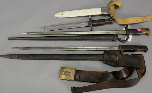 Three military bayonets including one by Wm. Solinger, a U.S. by Ross Rifle Co., and the last with press marks. lg. 14 1/2in. to 25 ...