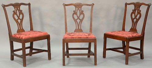 Set of three mahogany Chippendale side chairs having carved and cross thatched crest rail over open carved splat with slip seats all...