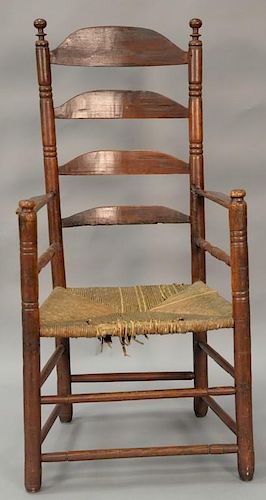 Primitive ladder back great chair having sausage turned supports and turned hand rests, (legs ended out). total ht. 47 1/4in.