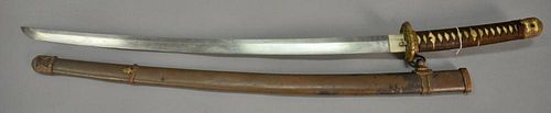 Japanese Samurai sword WWII era with military mounts and scabbard, signed. lg. 35in.
