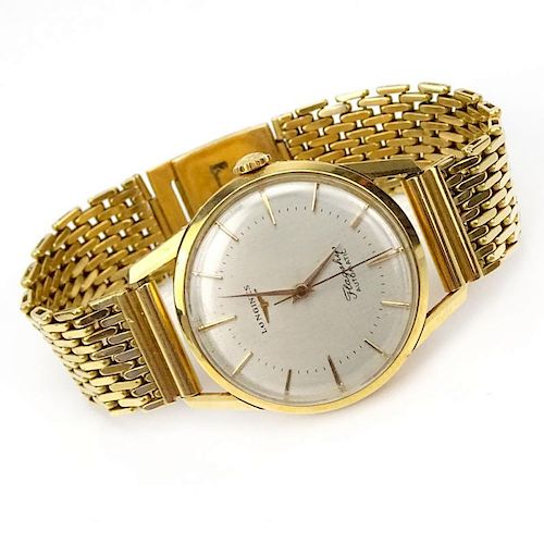 Man's Vintage Longines Flagship 18 Karat Yellow Gold Bracelet Watch with Automatic Movement