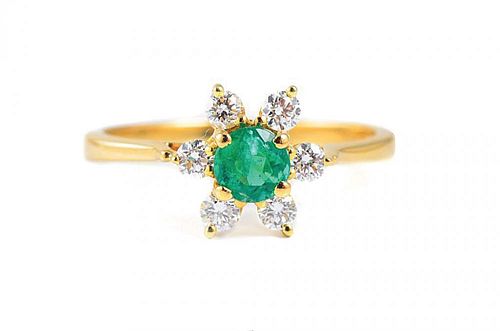 An Emerald and Diamond Gold Ring, by Tiffany & Co.