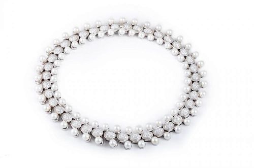 A Pearl Diamond Bracelet and Necklace Set, by David Morris