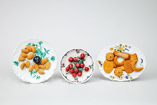 Group of Continental Trompe L'oeil Glazed Pottery Cherry, Olive, and Biscuit Plates