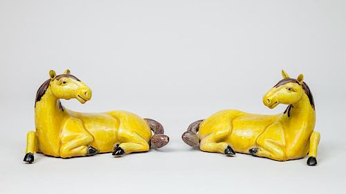 Pair of Chinese Yellow Glazed Recumbent Horses