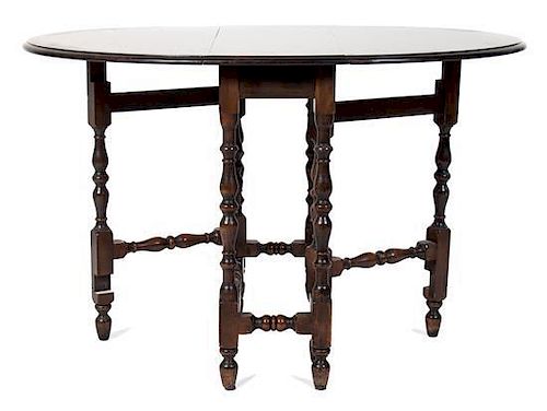 A Gate Leg Table Height 30 1/2 inches.