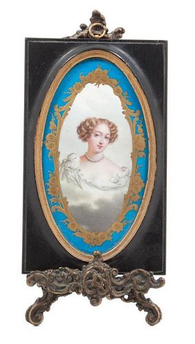 A Porcelain Portrait Plaque Height of frame 7 1/4 x width 4 1/2 inches.