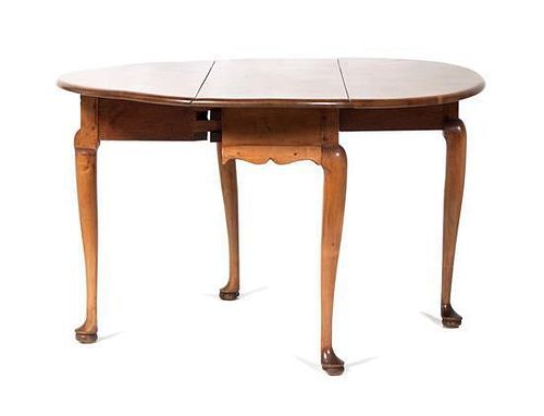 A Drop-Leaf Table Height 27 1/2 inches.