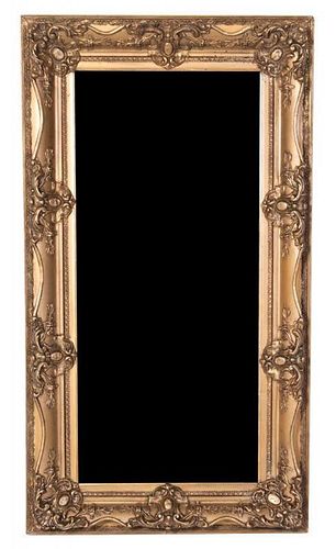 A Giltwood Mirror 50 x 27 1/2 inches.