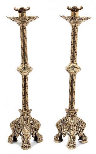 A Pair of Brass Pricket Sticks Height 17 inches.