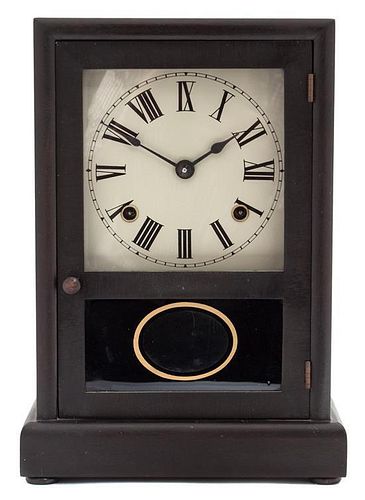 An American Ebonized Shelf Clock Height 12 3/4 inches.