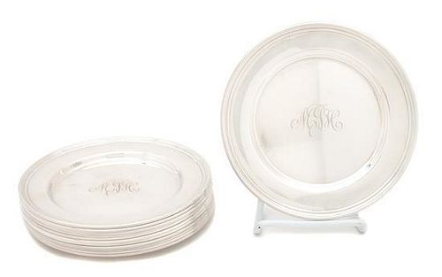 A Set of Twelve American Silver Bread Plates Diameter 6 inches.