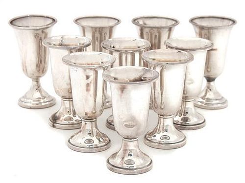 An Assembled Set of Ten Silver Cordials Height of tallest 3 1/4 inches.