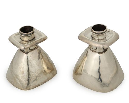 A near-pair of William Spratling sterling silver candlesticks