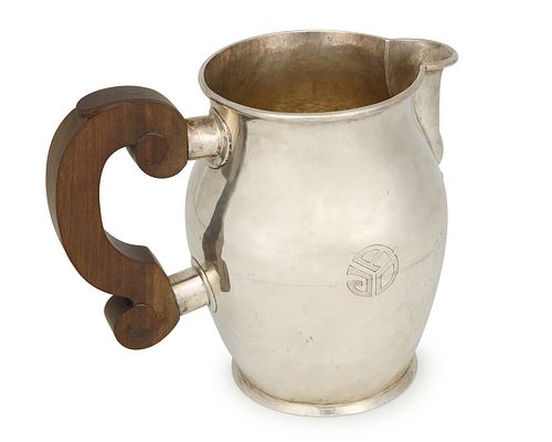 A William Spratling rosewood and silver pitcher
