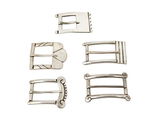 A group of Hector Aguilar sterling silver belt buckles