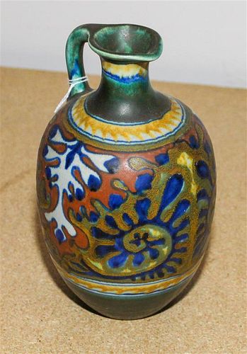 * A Gouda Pottery Ewer Height 8 1/4 inches.