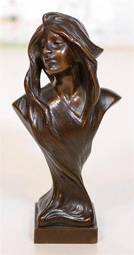 * An Art Nouveau Bronze Bust. Height 5 1/4 inches.