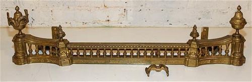 A French Gilt Metal Fire Fender Height 10 3/8 x width 38 1/2 inches.