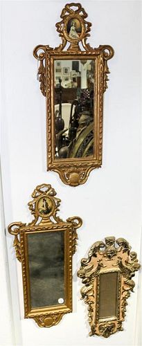 * A Pair of Italian Carved and Silvered Mirrors Height of pair 24 x width 13 inches.