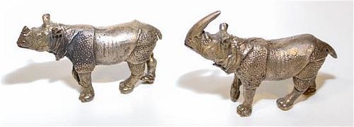 * Two Bronze Rhinos. Width of wider 4 1/8 inches.