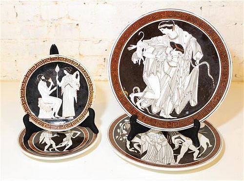 * Four Greek Porcelain Plates. Diameter of largest 13 1/4 inches.