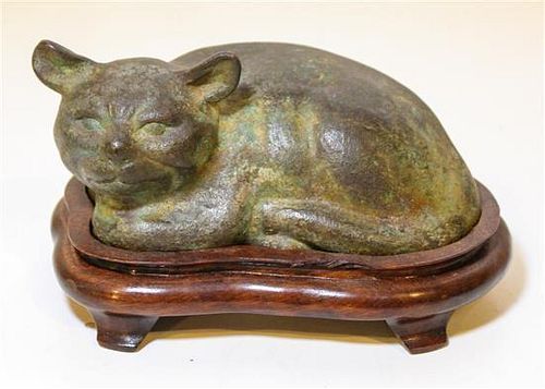 * A Bronze Sleeping Cat. Width 6 inches.