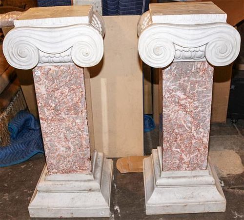 * A Pair of Neoclassical Marble Columns. Height 42 inches.
