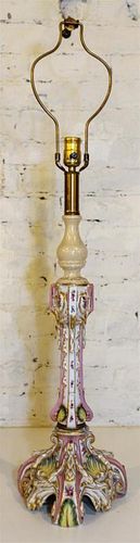 * A German Porcelain Candlestick Mounted as a Lamp. Height of porcelain 17 3/4 inches.