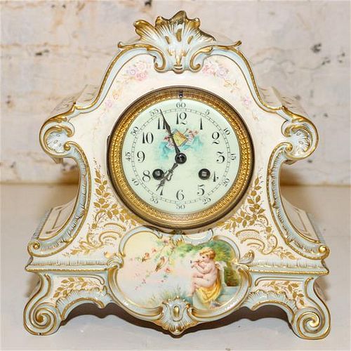 A Continental Porcelain Mantle Clock. Height 11 inches.