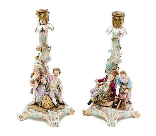 * A Pair of Meissen Porcelain Figural Candlesticks Height 12 3/4 inches.