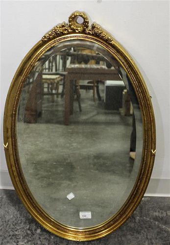 A Victorian Style Giltwood Mirror Height 31 inches.