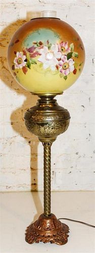 A Victorian Cast Metal and Painted Glass Table Lamp Height 29 1/2 inches.