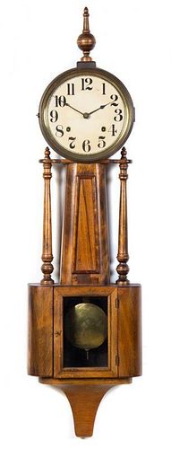 * An American Oak Banjo Clock Length of case 39 inches.