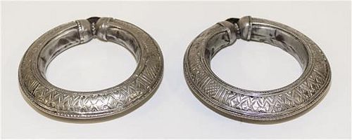 A Pair of Yemeni Silver Bangles Diameter of exterior 4 1/4 inches.