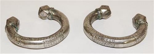 A Pair of Bedouin Silver Bangles Diameter of exterior 3 1/2 inches.