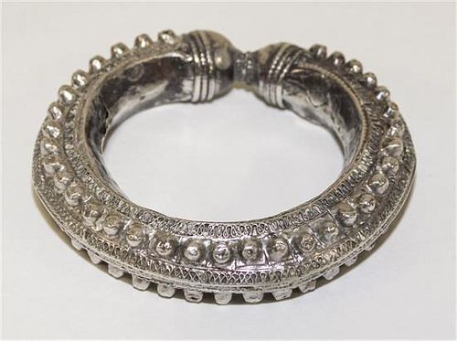 A Yemeni Silver Bangle Diameter of exterior 3 3/4 inches.