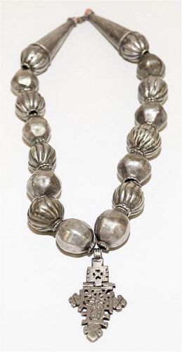 A Silver and Coral Beaded Necklace Length of chain 18 1/2 inches.
