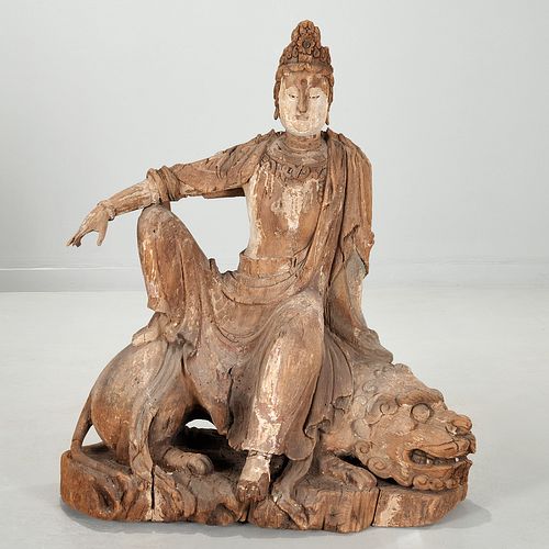 Large Chinese carved wood Guanyin on lion
