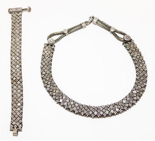 A Silver Necklace and Bracelet Length of chain 9 1/2 inches.