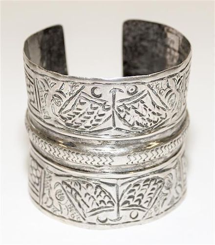 An Egyptian Silver Cuff Bracelet Diameter of exterior 2 3/4 inches.