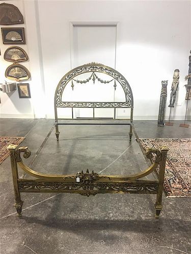 A Louis XVI Style Gilt Bronze Bed. Height 54 1/2 x width 54 inches.